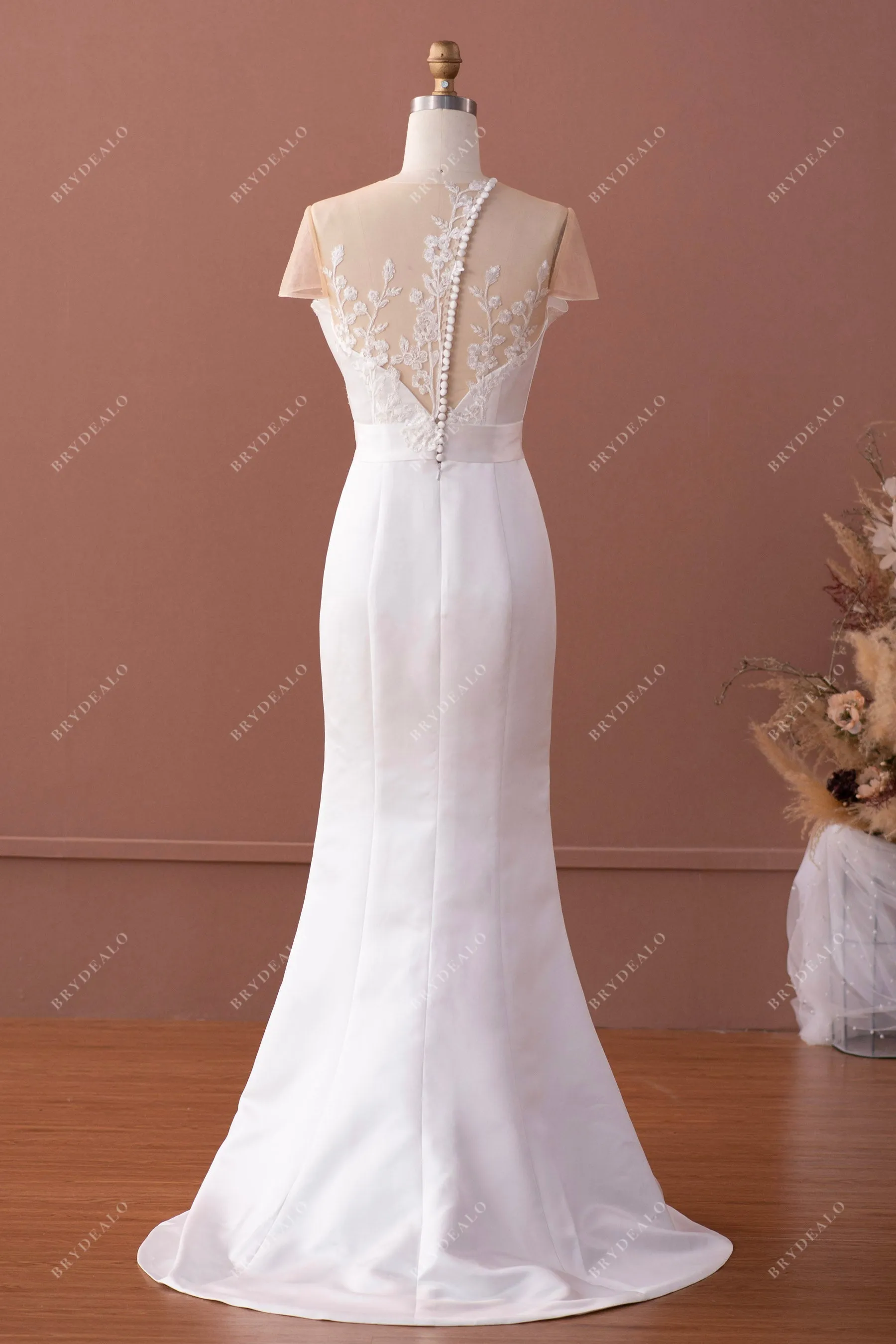 Designer Ruffled Satin Inclined Buttoned Back Mermaid Bridal Gown