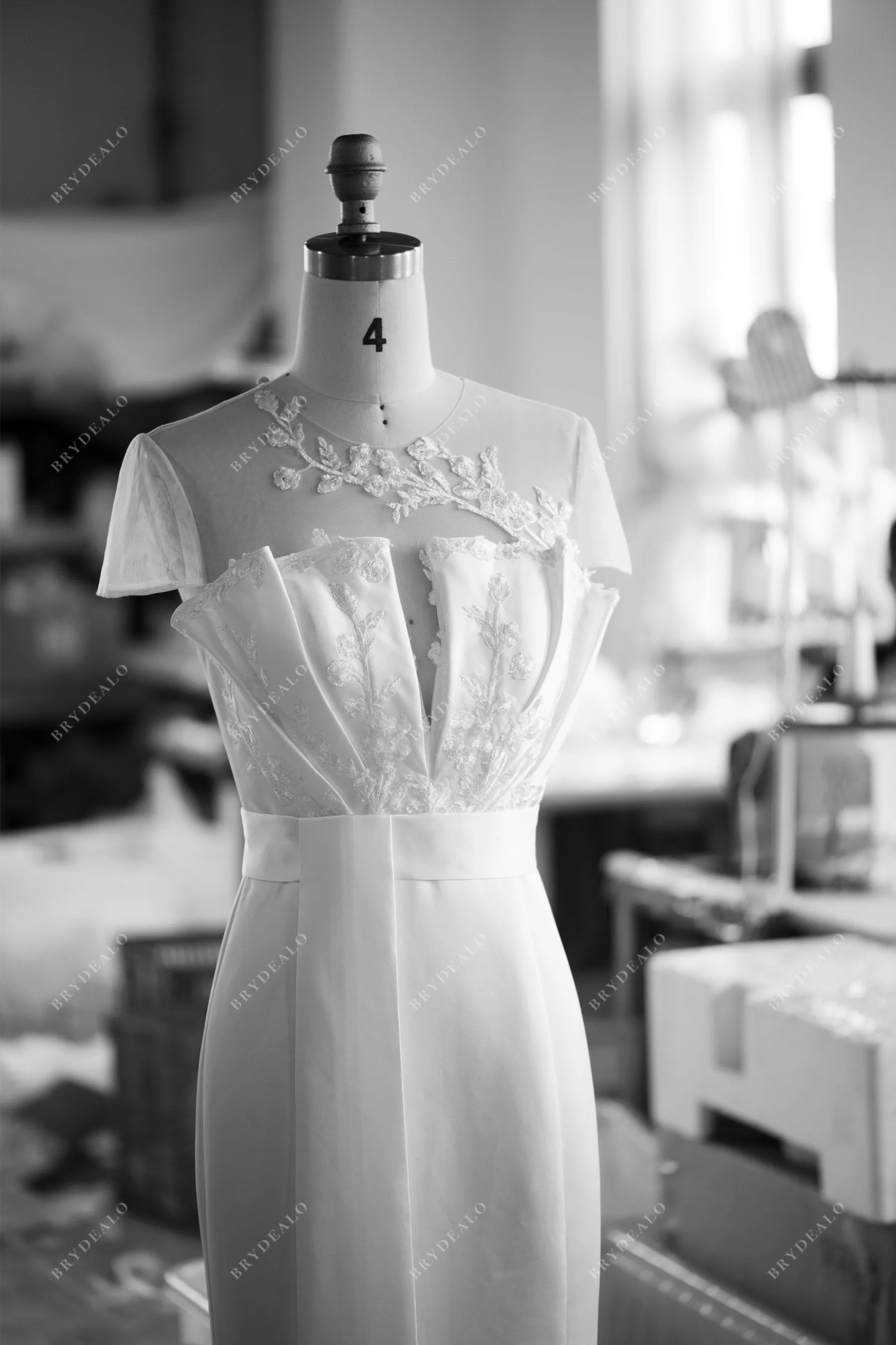 Designer Ruffled Satin Inclined Buttoned Back Mermaid Bridal Gown