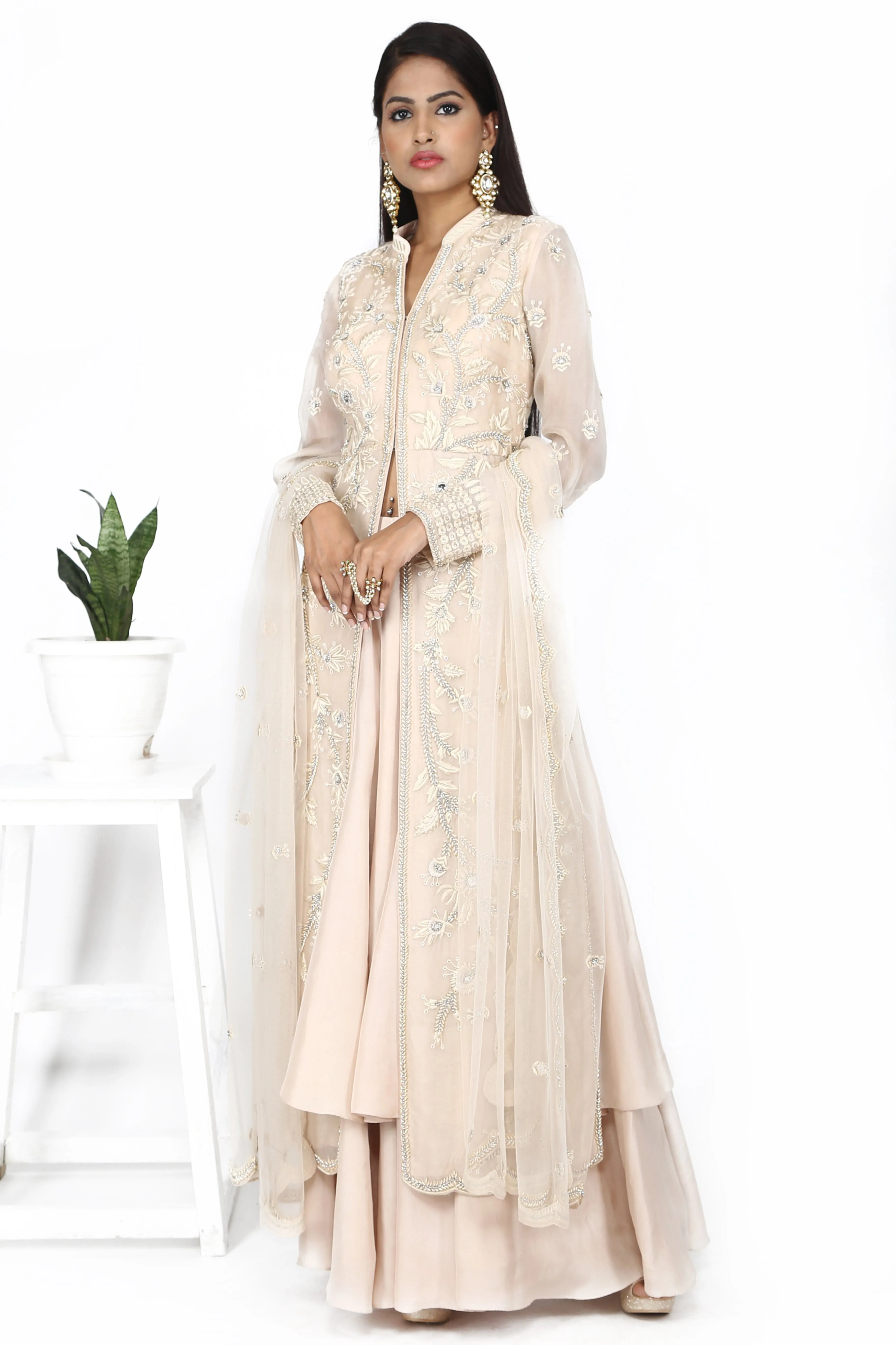 Soft pink sharara set.